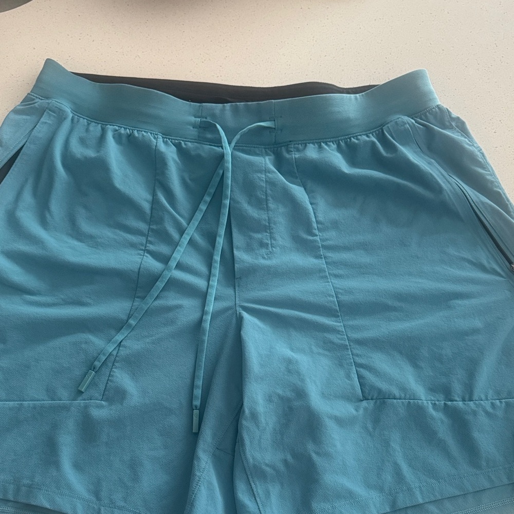 Lululemon Athletica License to Train Teal Shorts